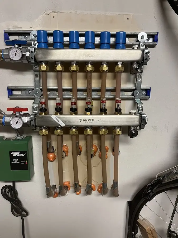 Plumber performing Leak Detection at a residential property in Upton